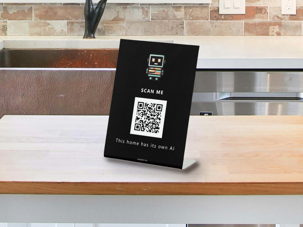 AskBnB QR code stand on a butcher-block kitchen island